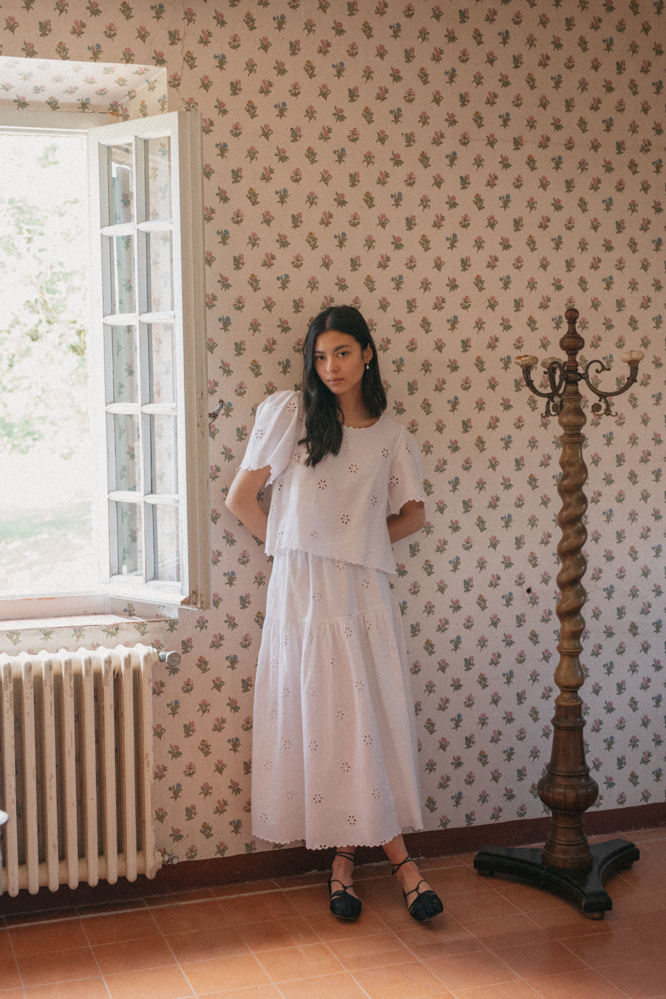 Model wearing the Stella Skirt in Salt by Gillian Stevens, full-length front view in a vintage room