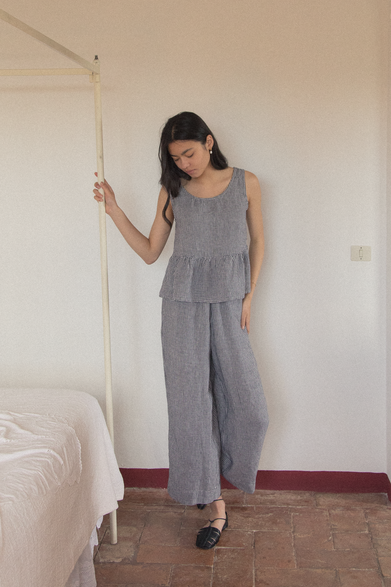 Model wearing the Olive Pant in Marine Gingham by Gillian Stevens, full-length front view