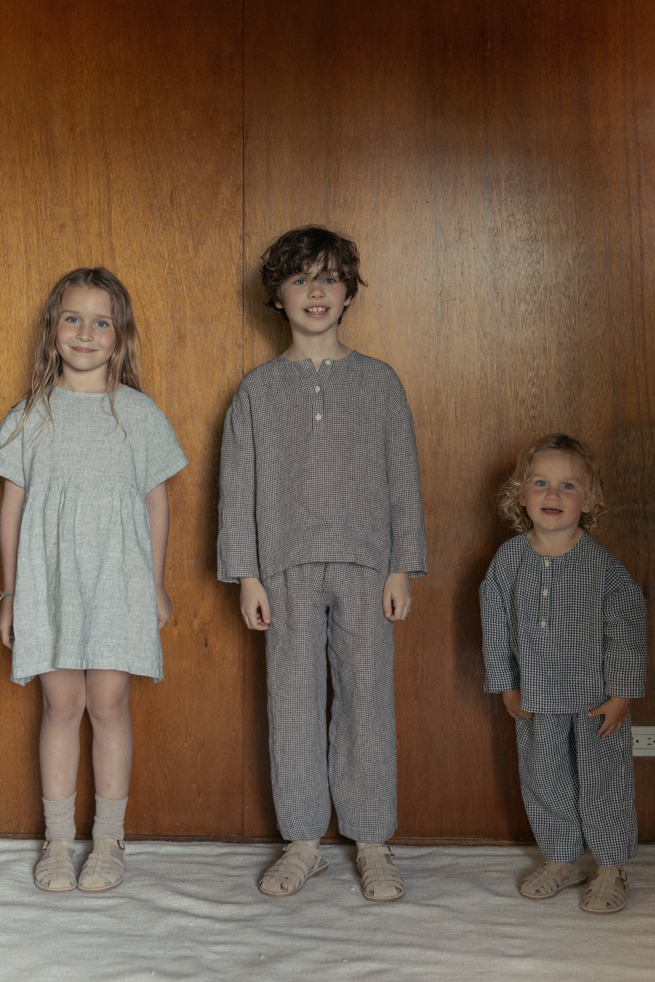 Child model wearing the Bertie Top in Espresso Gingham by Gillian Stevens