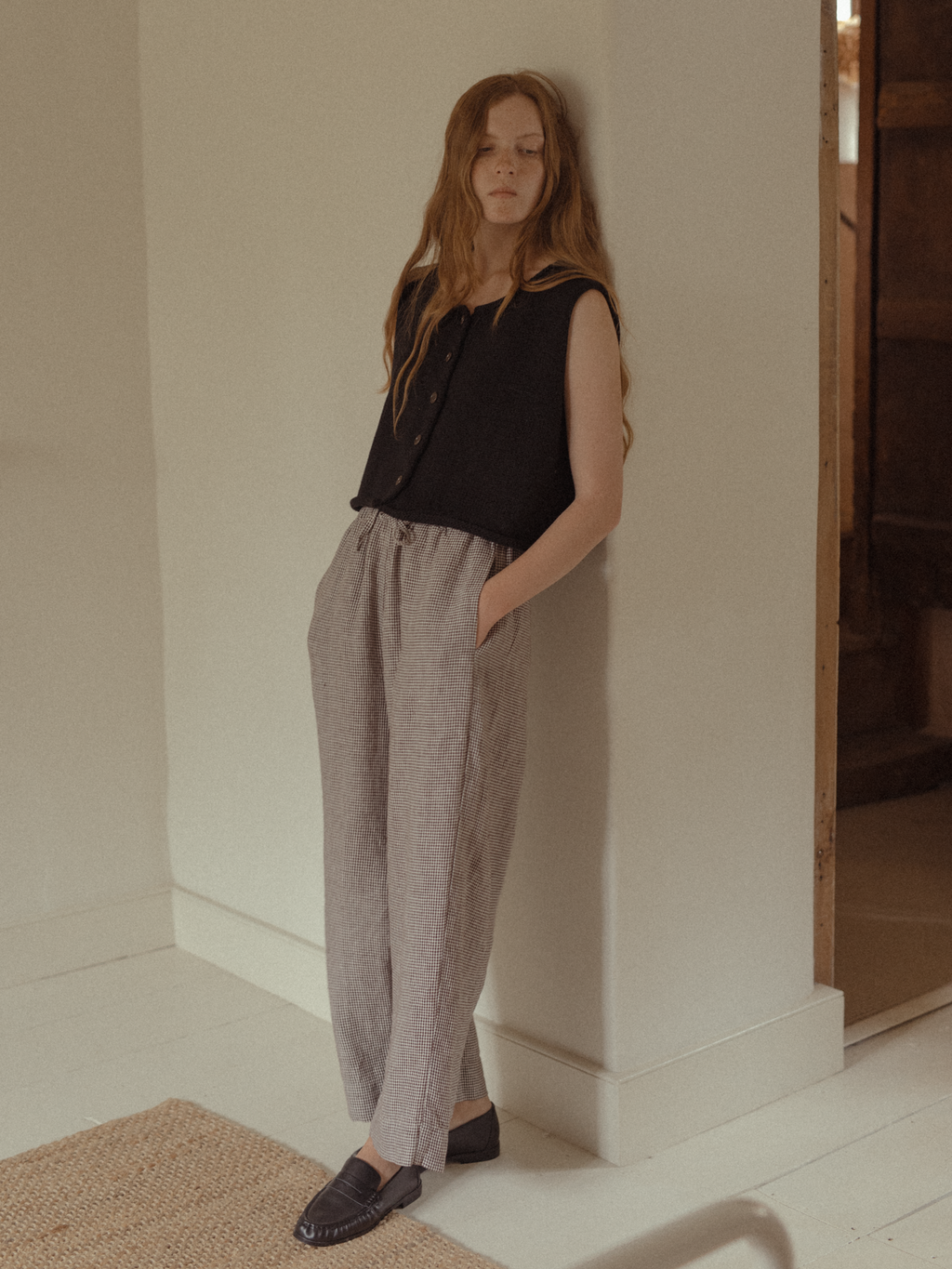 Model wearing the Olive Pant in Espresso Gingham by Gillian Stevens, full-length front view