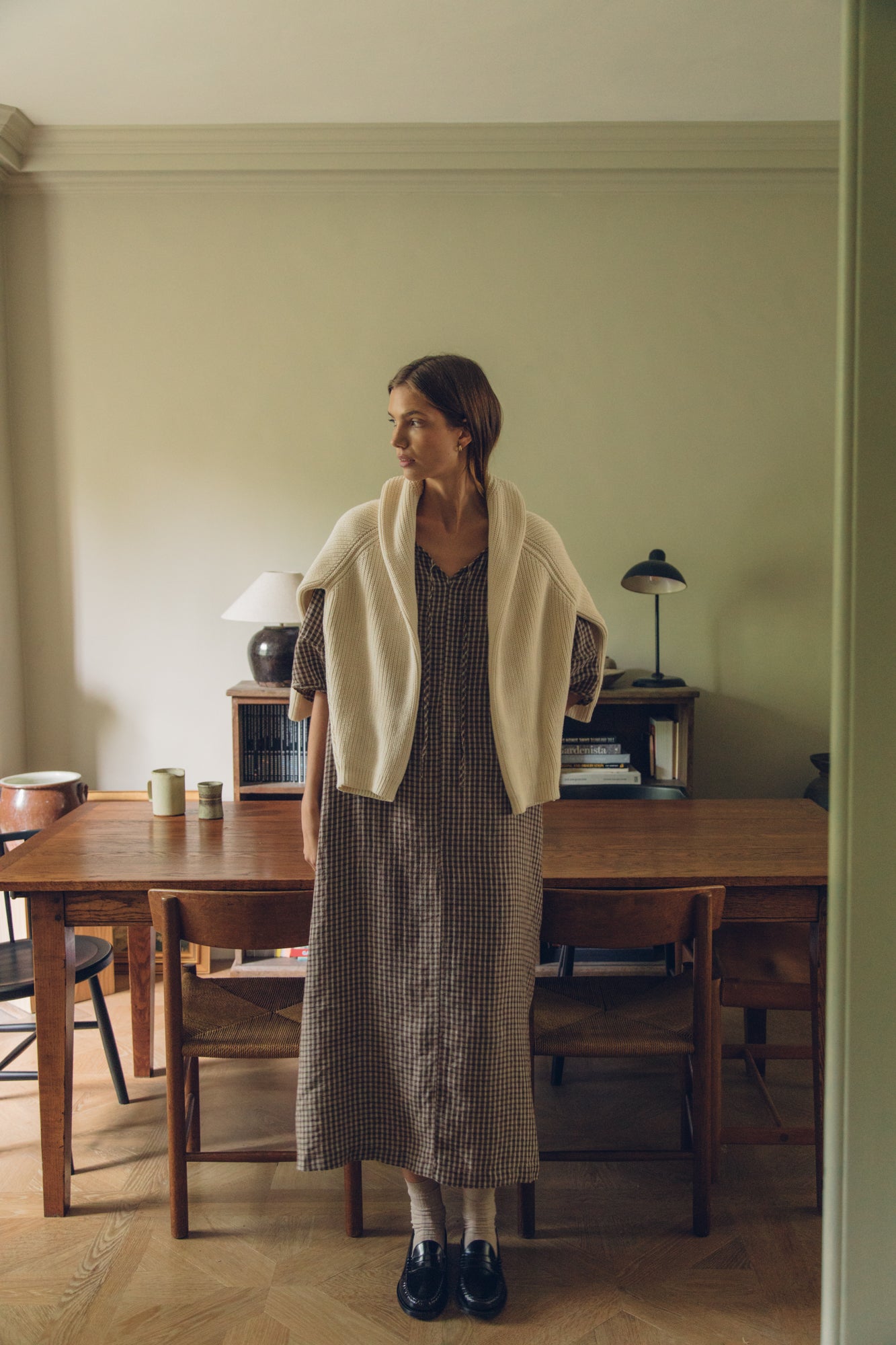 Model wearing the Blair Dress in Chocolate Plaid by Gillian Stevens